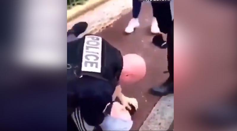 Fransız polisinden başörtülü kadına şiddet!